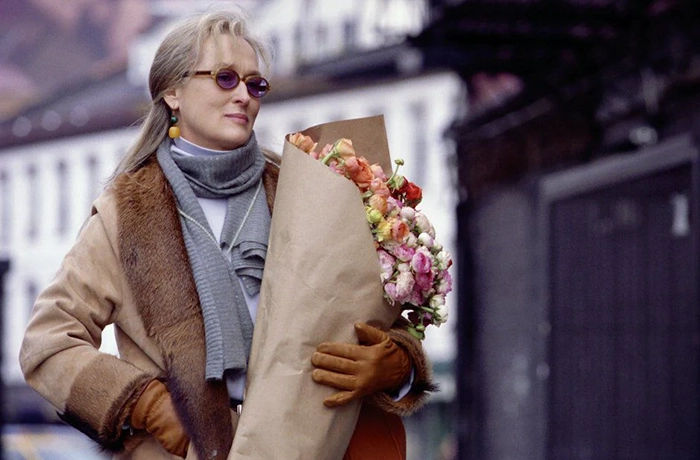 Meryl Streep con un ramo de flores